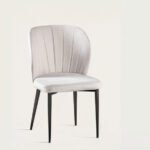 Upholstered chair with slatted fabric